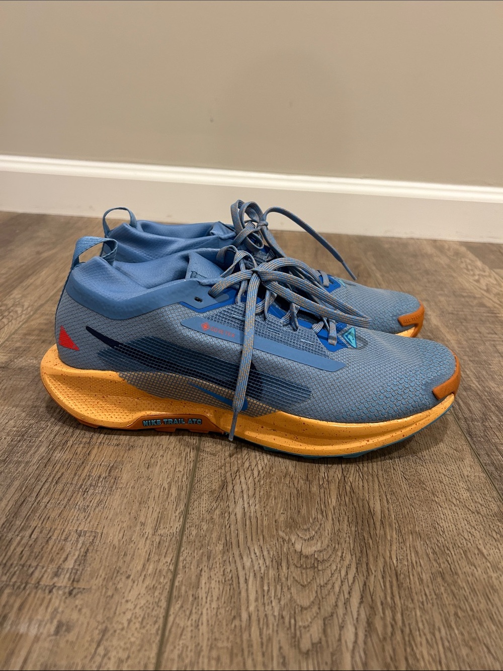 Nike Men’s Light Blue and Orange Trail Running Shoes